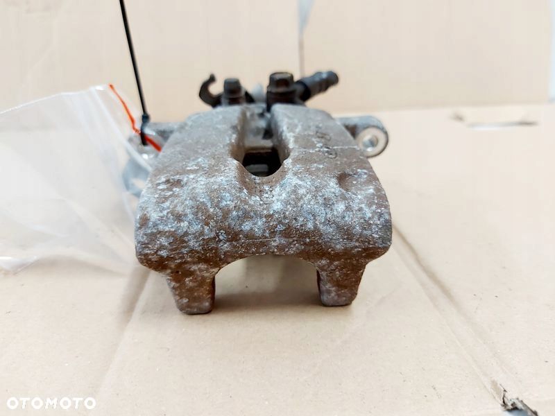 KIA CEED II 2 1.6 CRDI ZACISK HAMULCOWY LEWY TYŁ - 2