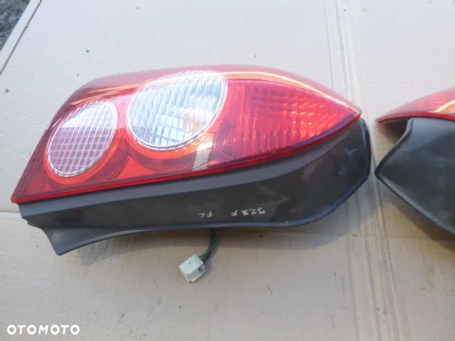 LAMPA LEWY TYŁ PRAWY TYŁ KOMPLET MAZDA 323F LIFT 01-03 - 14
