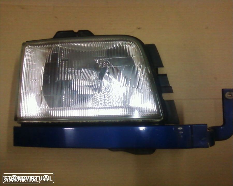 farol direito opel monterey b ano 1999 - 1