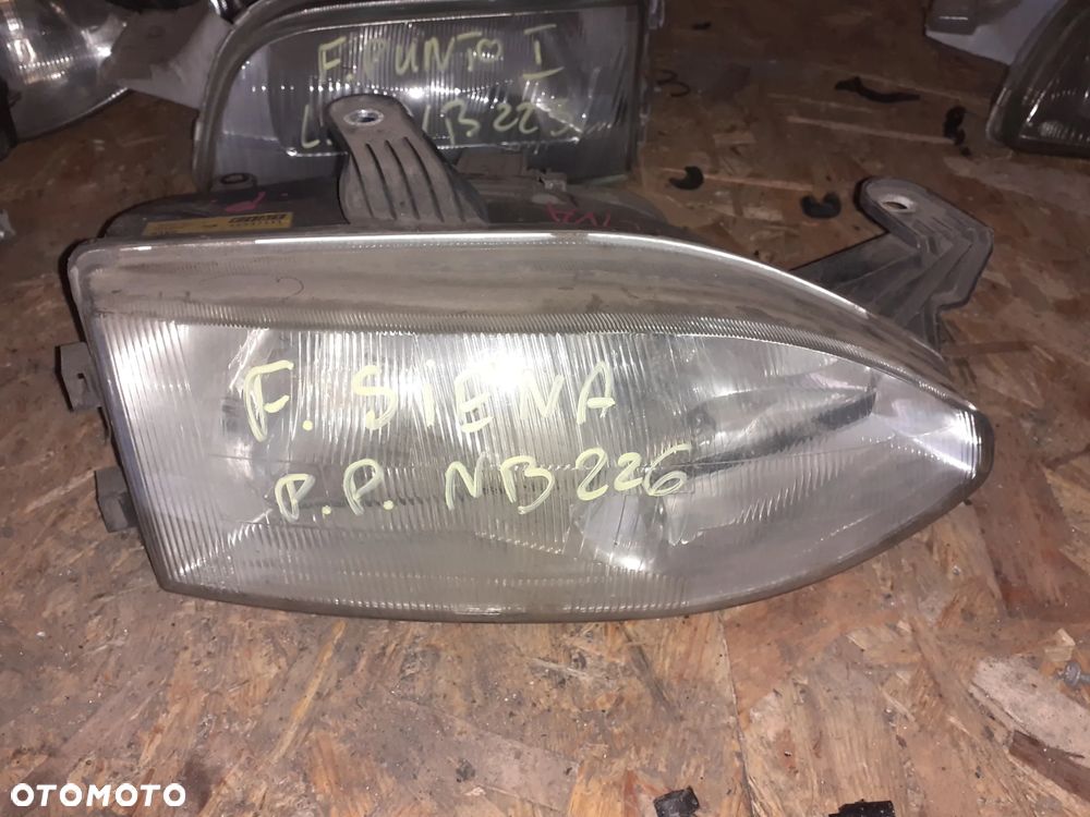 Reflektor PRAWY PRAWA LAMPA PRZÓD FIAT SIENA - 1
