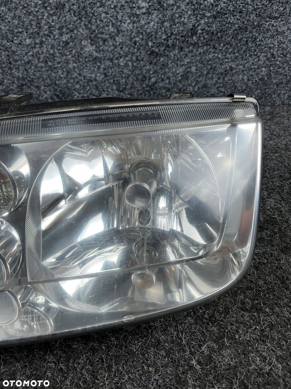 vw bora reflektor lampa lewy przód lewa przednia hella OE - 5