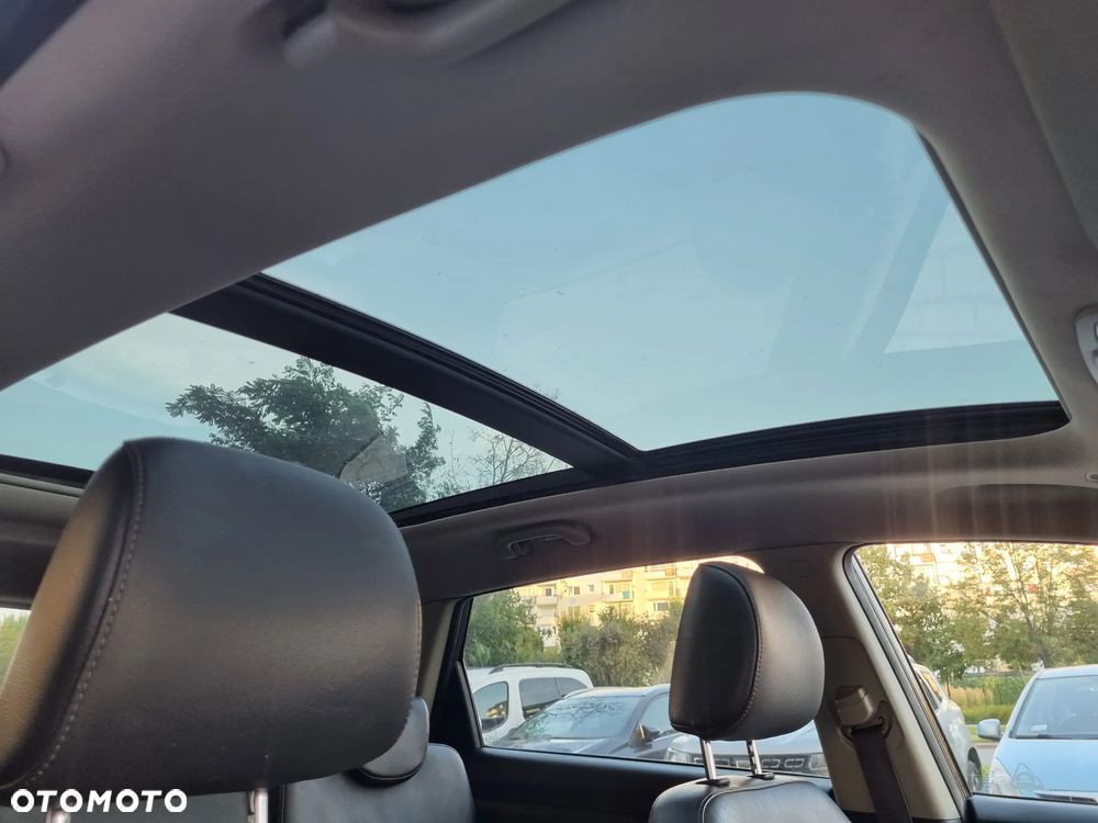Kia Carens - 15