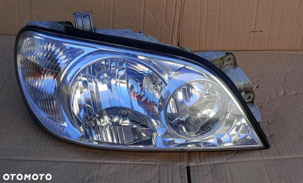 Reflektor prawy Lampa prawa Kia Carnival 2001-