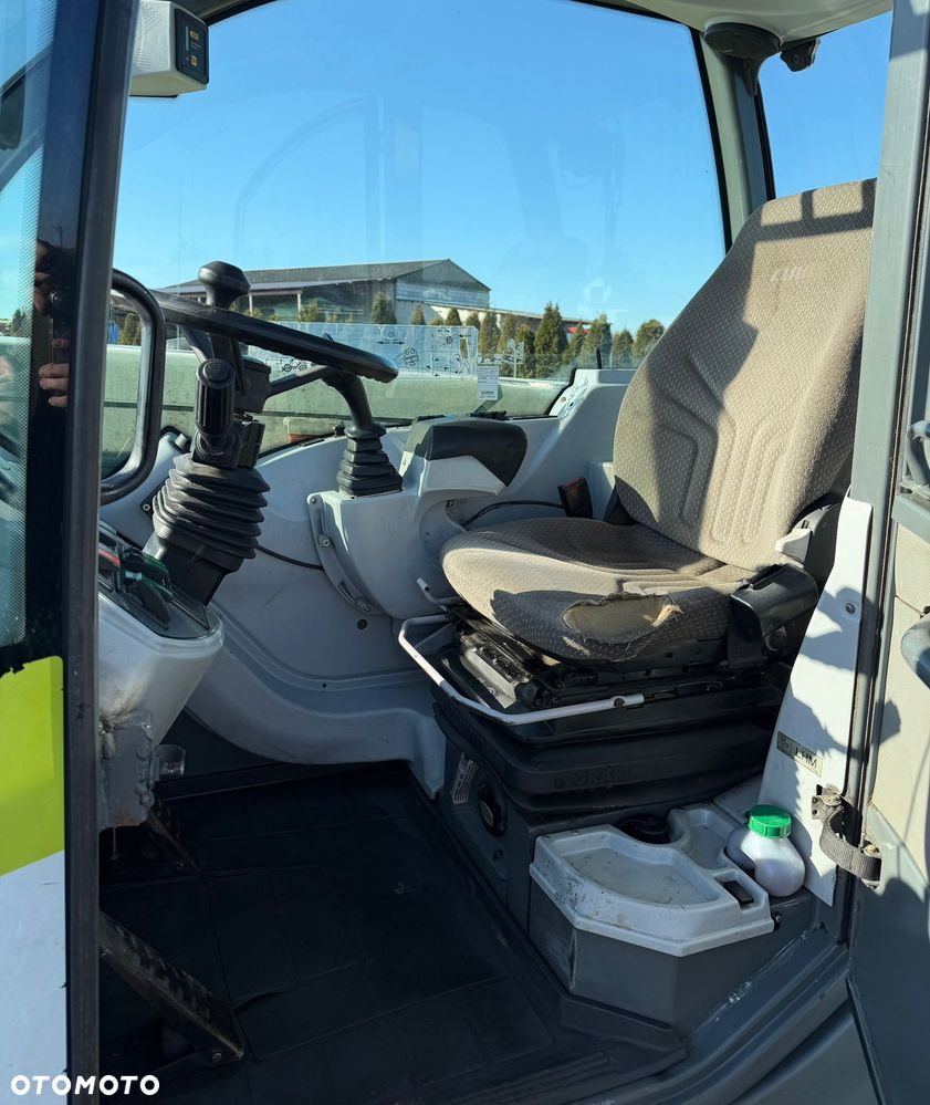 Claas scorpion 7040 - 9