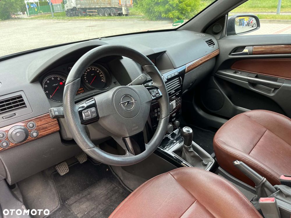 Opel Astra 1.8 Cosmo - 11