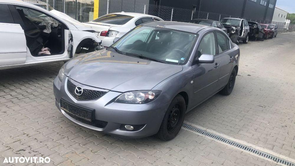 Dezmembram Mazda 3 Sedan 1.6 benzina an fabr 2006 - 1