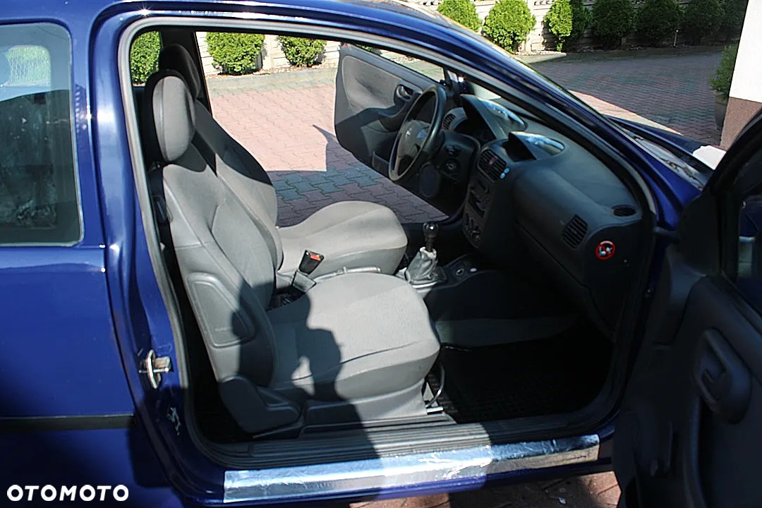 Opel Corsa 1.2 16V Cosmo - 11