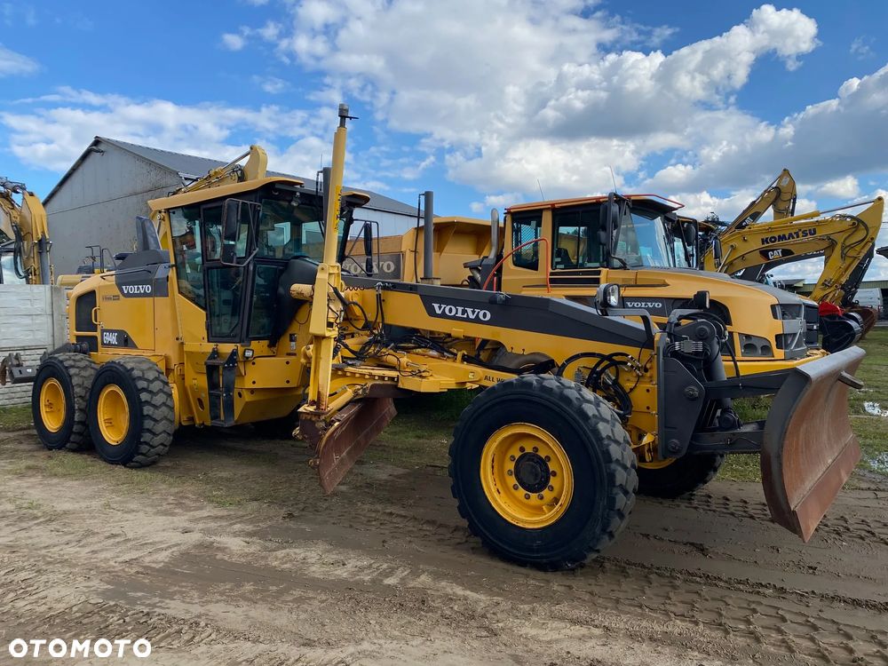 Volvo G946C, 2015 ROK, SYSTEM TRIMBLE 3D + TACHIMETR, NAPĘD 6X6, JOYSTICKI, ZRYWAK, PRZEDNI PŁUG, - 1