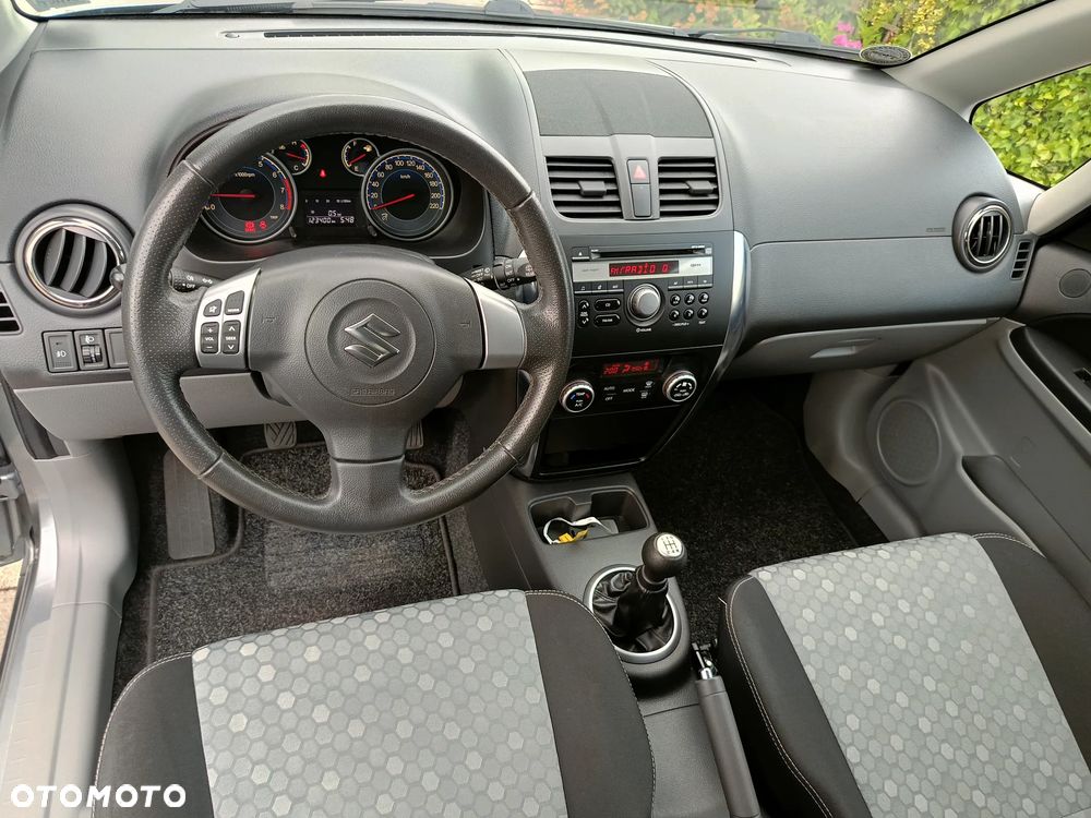 Suzuki SX4 1.6 Comfort Plus - 9