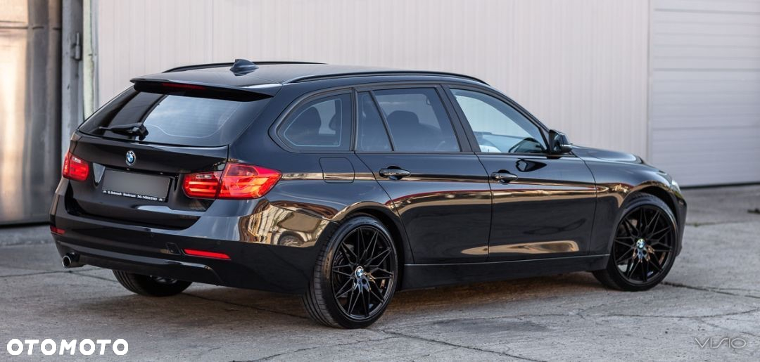 BMW Seria 3 318d DPF Touring Edition Sport - 14
