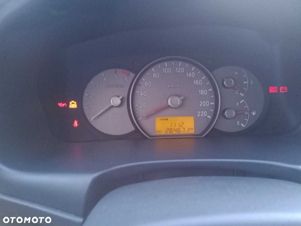 Kia Carens - 7