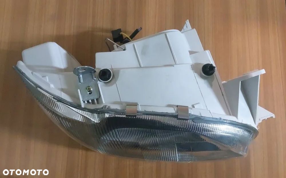 Reflektor prawy pasuje do Ford Escort - 3