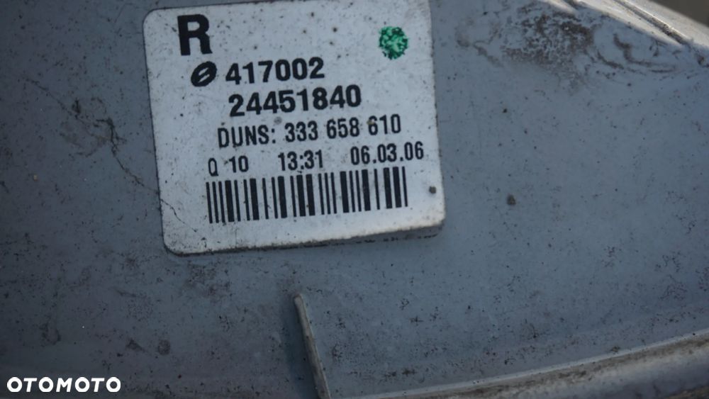 REFLEKTOR LAMPA ZBIORNIK PŁYNU SCHOWEK PASAŻERA ASTRA H - 8