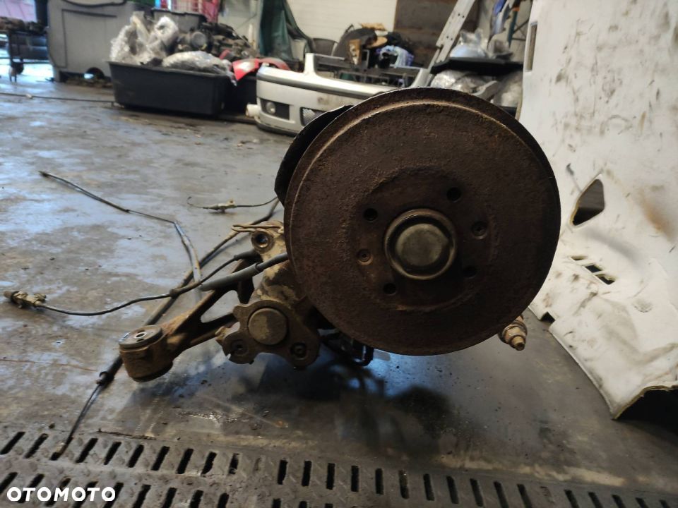 BELKA ZAWIESZENIA TYŁ BĘBNY NISSAN PRIMERA P11 - 4