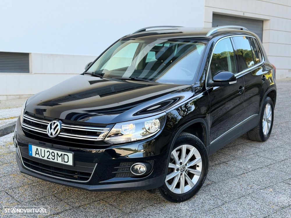 VW Tiguan 1.4 TSI 4Motion Exclusive - 1
