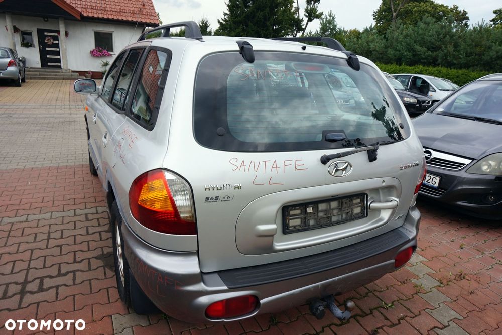 KLAPA BAGAŻNIKA TYLNA SANTA FE I SM LL  SREBRNY HYUNDAI 2000-2006 - 2