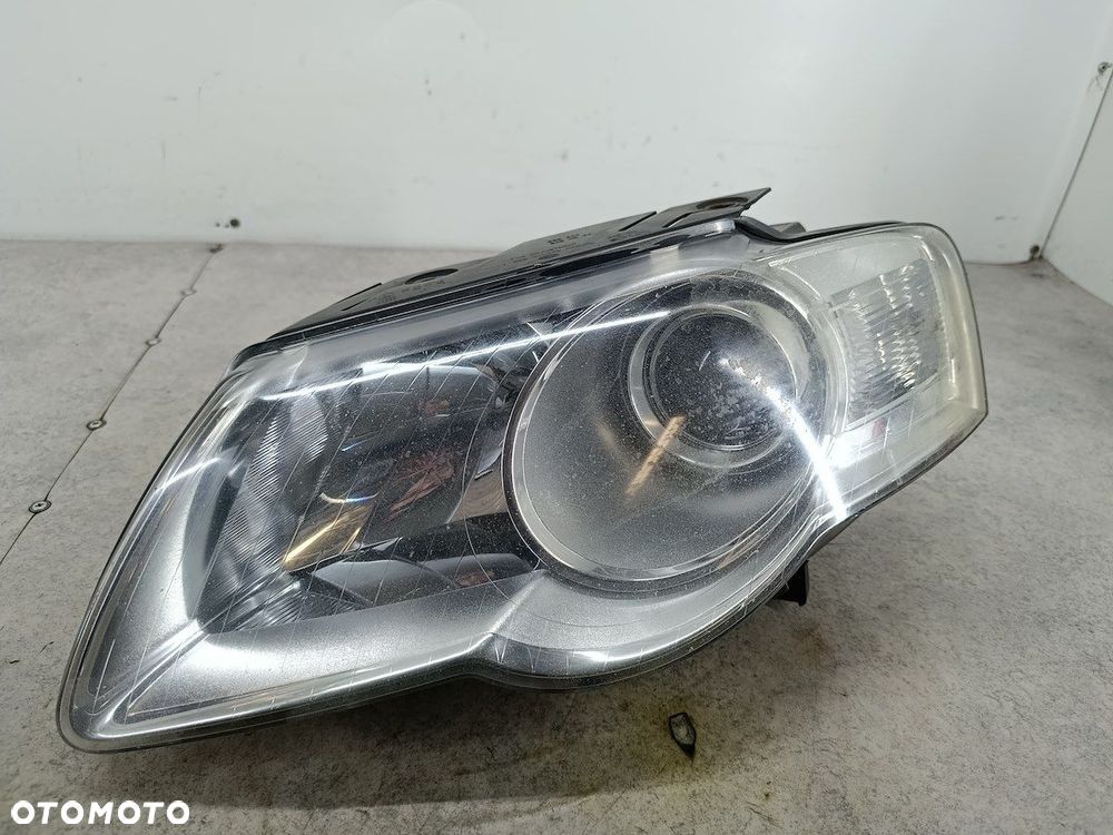 LAMPA PRZÓD LEWA VW PASSAT B6 3C0941005Q 1EL247014-11  HELLA - 2