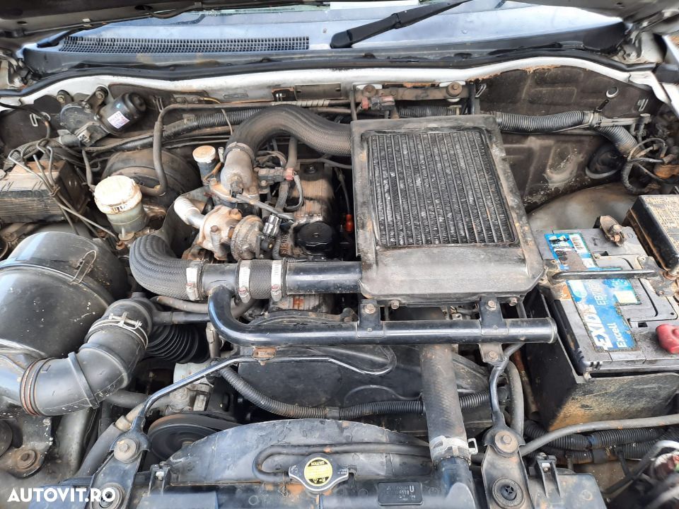 galerie admisie evacuare motoras stergator pompa abs servodirectie frana tulumba pompa inalte Mitsubishi Pajero Shogun Sport motor 2.5td 115cp 4d56-t dezmembrez dezmembrari - 6