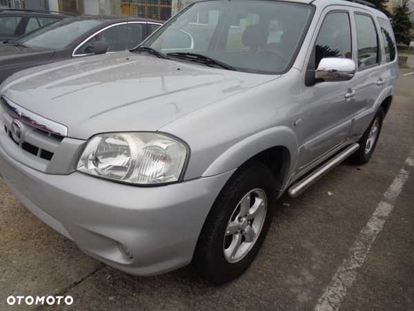 MAZDA TRIBUTE SREBRNA BLOTNIK LEWY PRAWY BDB STAN  CZESCI ROZNE DRZWI KLAPA ITP