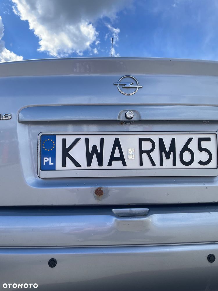 Opel Astra 1.6 Cosmo - 12