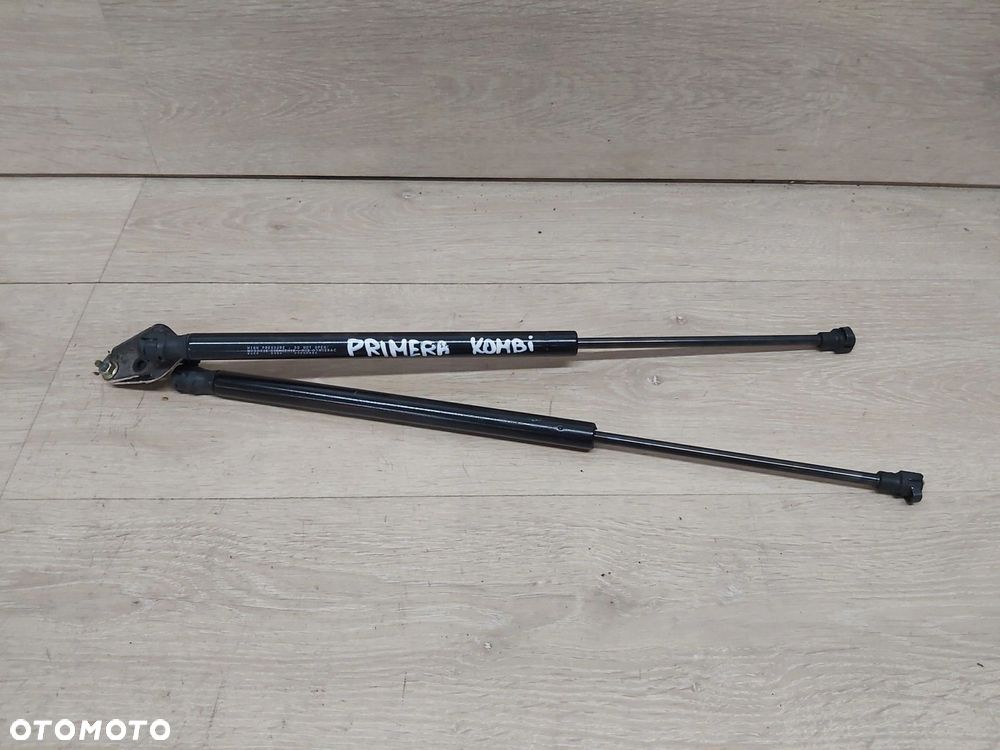 Nissan Primera P12 siłownik klapy tył Kombi - komplet 2szt - 12