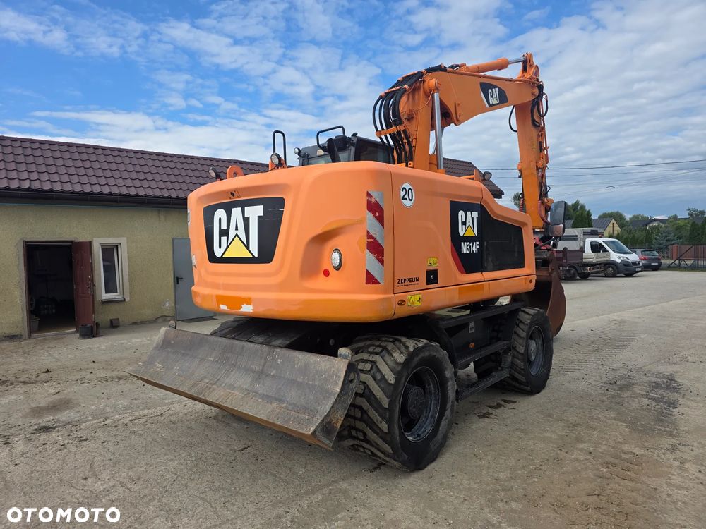 Caterpillar Cat M314F Rototil z Niemiec - 5