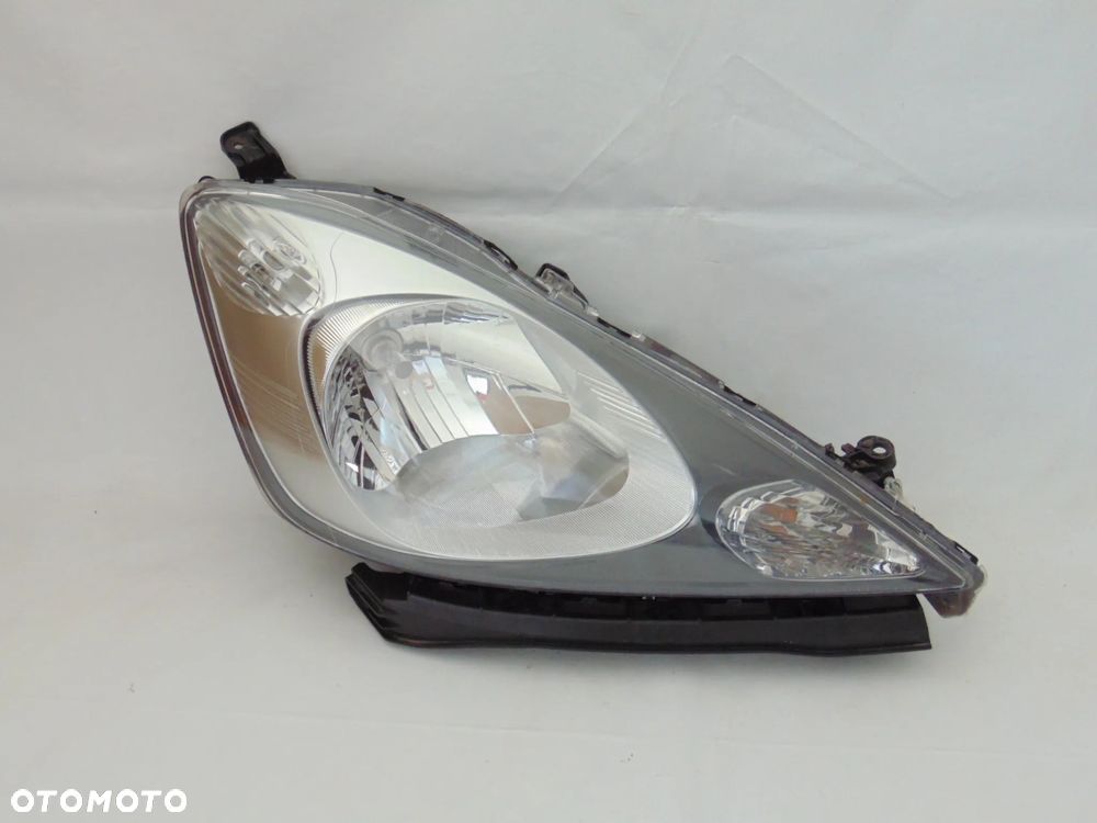 Lampa przednia przód lewa prawa Honda Jazz 3 III 08-11r - 2