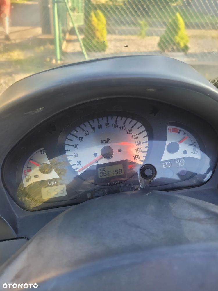Suzuki Burgman - 4