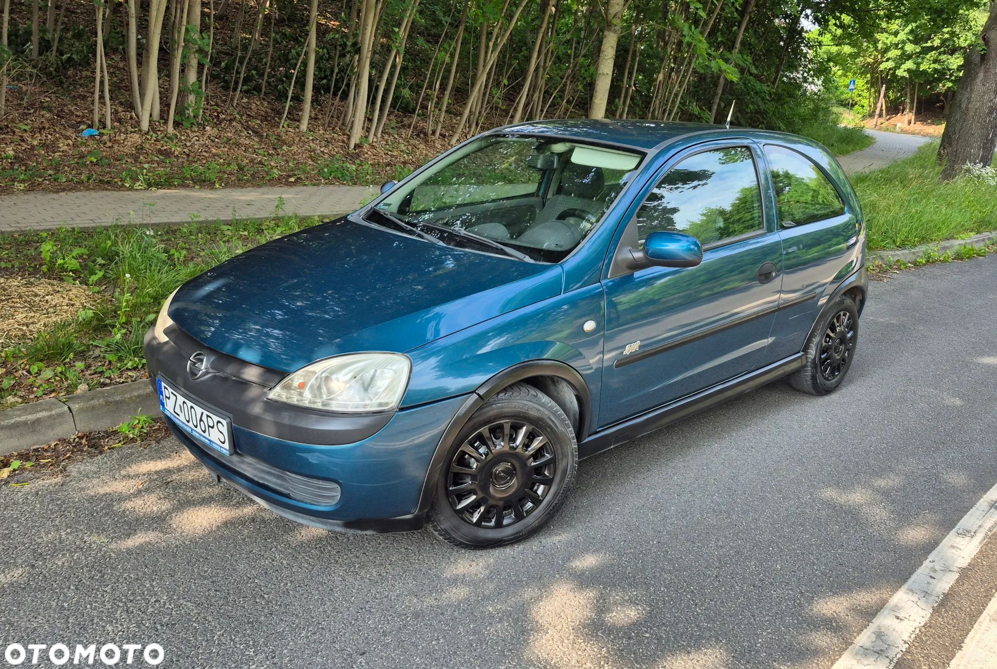 Opel Corsa 1.2 16V Elegance - 1