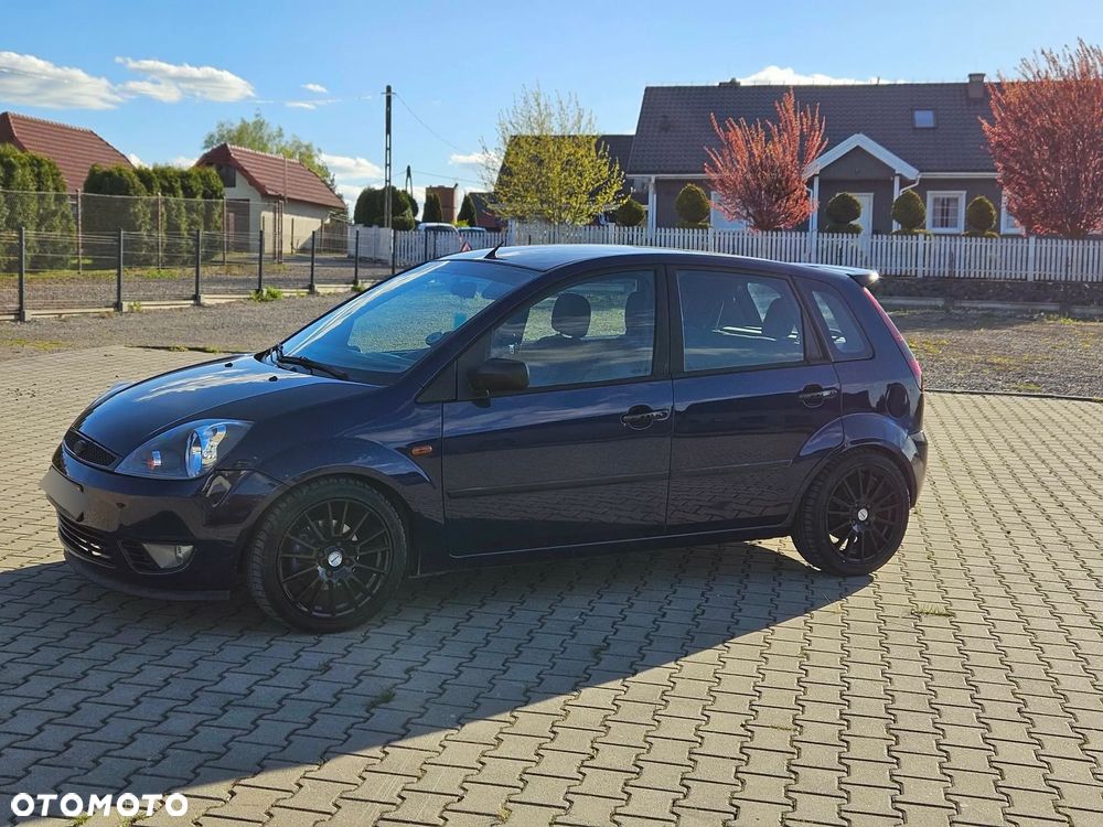 Ford Fiesta 1.4 Ghia - 4