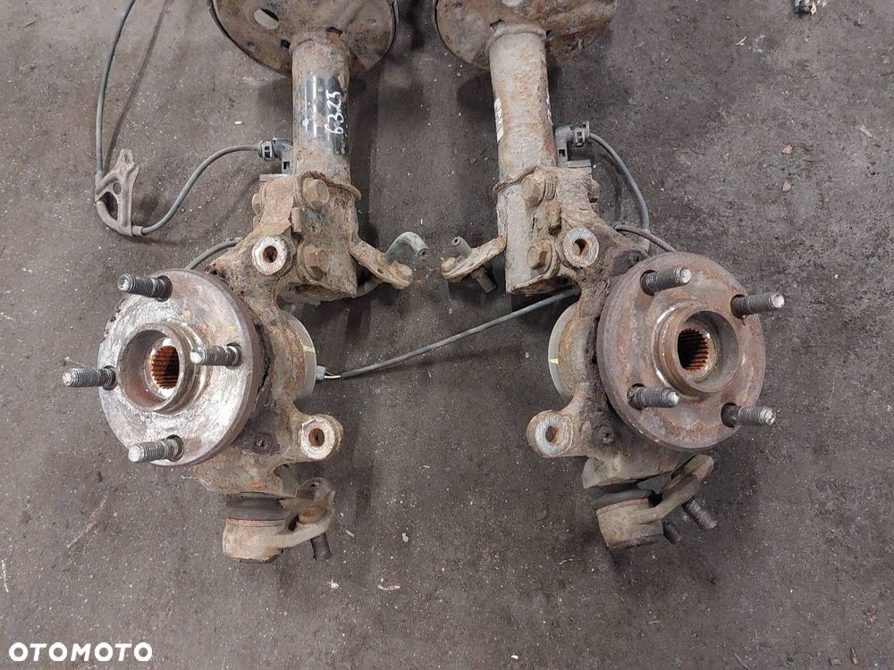 AMORTYZATOR SPRĘŻYNA ZWROTNICA LEWY PRAWY PRZÓD TOYOTA COROLLA E11 - 4