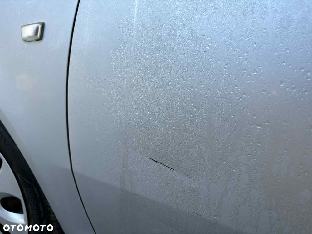 Opel Corsa 1.2 16V Enjoy - 15