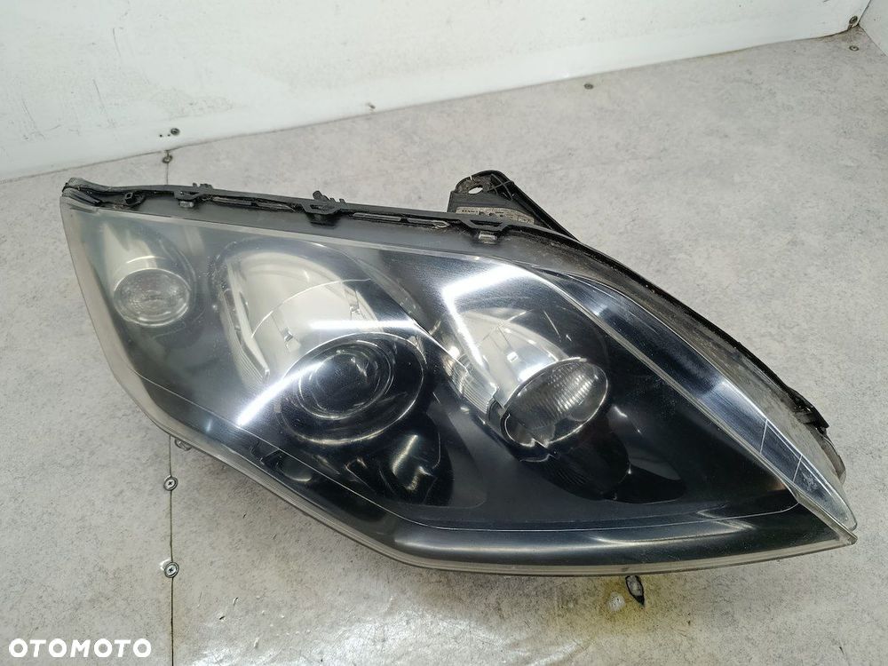 LAMPA PRZÓD PRAWA XENON RENAULT LAGUNA III 260100043R 89902279 89034934 - 3