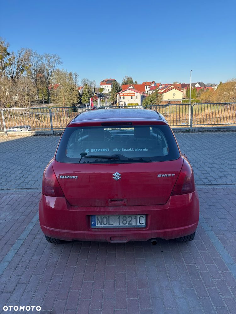 Suzuki Swift 1.3 Club - 4