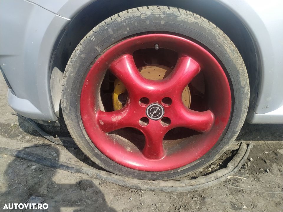 Dezmembrari  Opel TIGRA B TwinTop  2004  > 0000 1.8 Benzina - 6