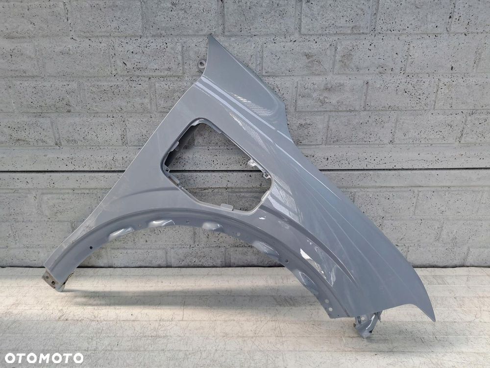 RENAULT MEGANE 5 V E-TECH 24- BŁOTNIK PRZEDNI PRAWY ORYGINAŁ