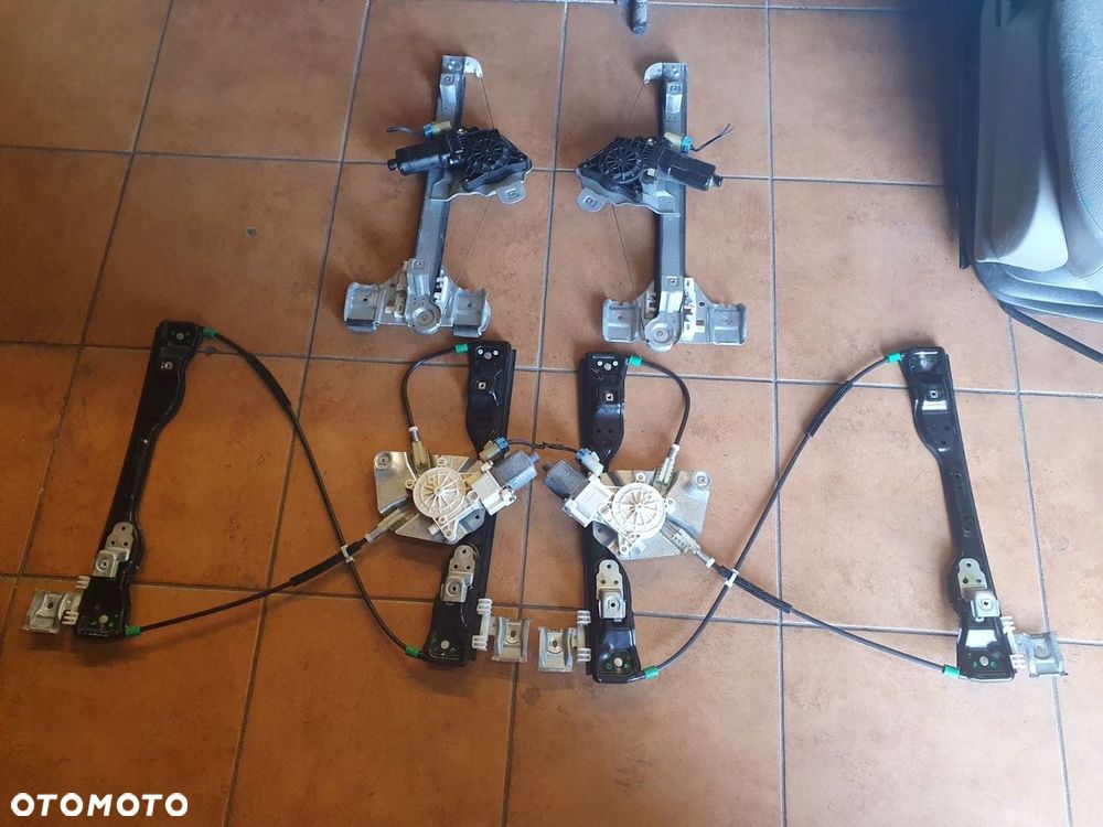 PODNOŚNIK SZYBY PRZÓD TYŁ L/P HUMMER H3 - 1