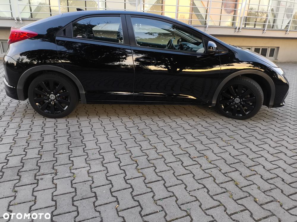 Honda Civic 1.4 i-VTEC Comfort - 12