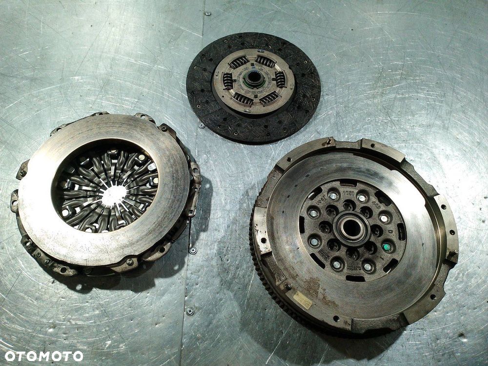 KOŁO DWUMASOWE KOMPLETNE FORD TRANSIT CUSTOM GK21-7563-BA  GK21-6477-AA 2.0 - 9