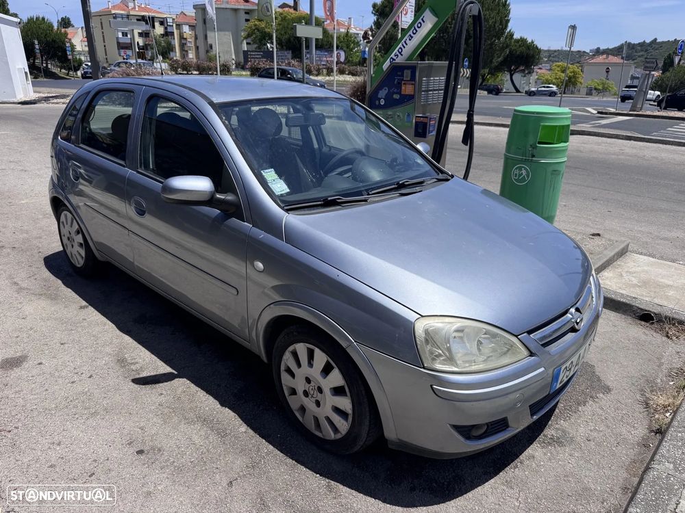 Opel Corsa 1.2 Twinport Enjoy - 1