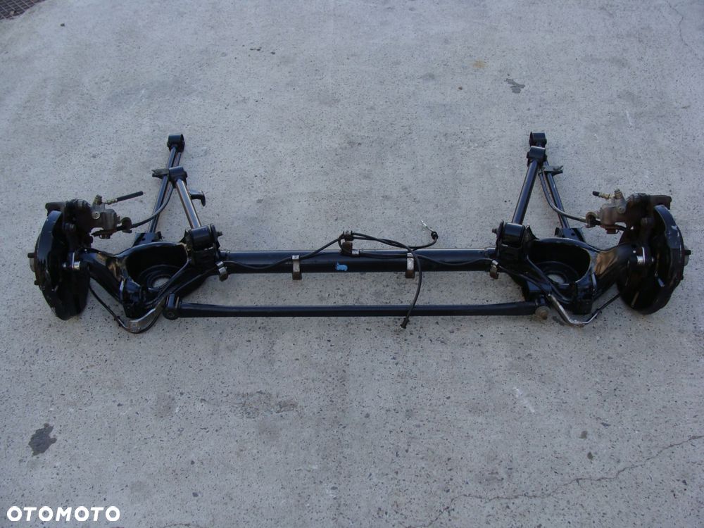 oś tylna belka zawieszenia micra k11 abs tarcza zacisk !!! - 2