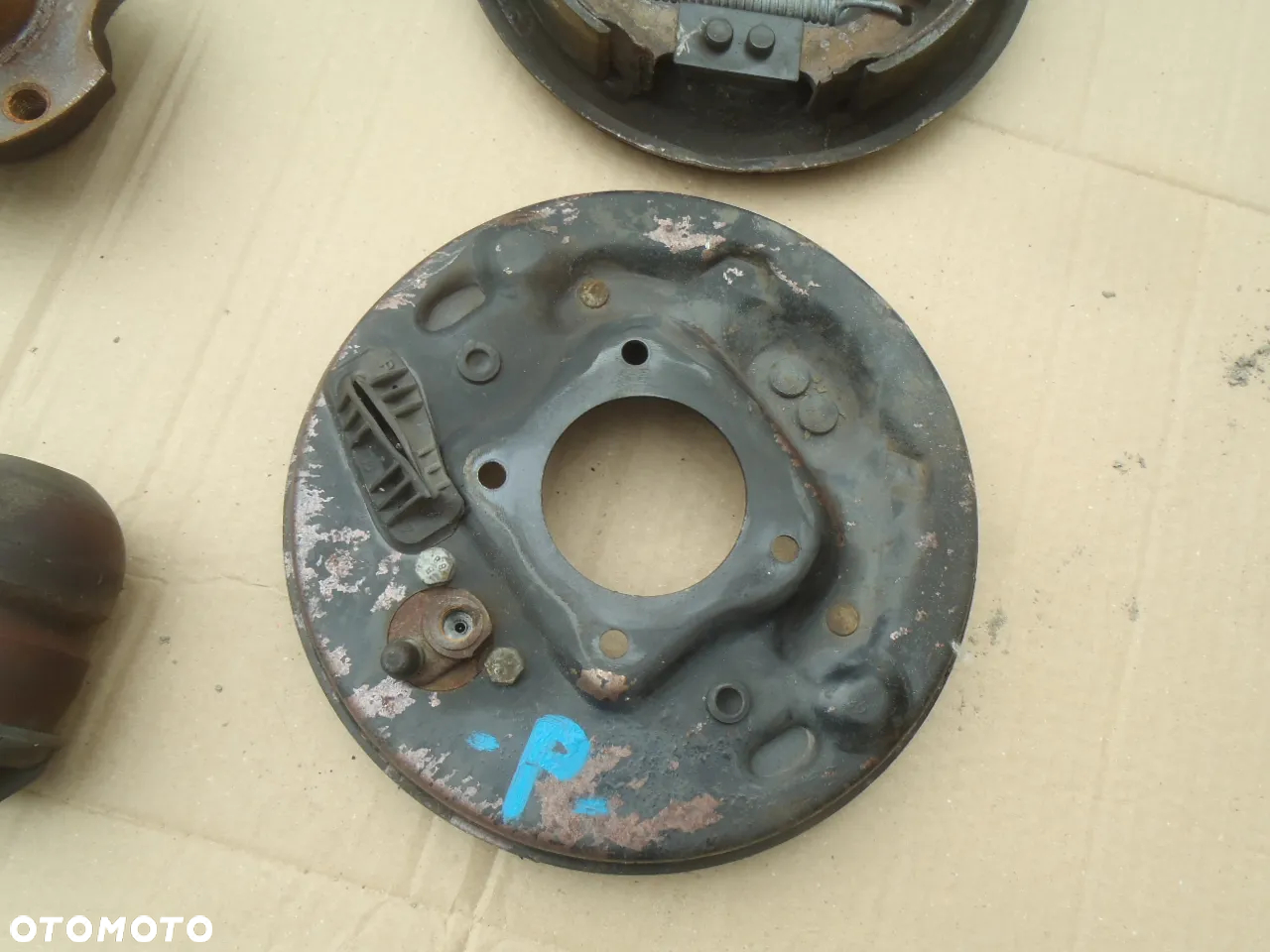 piasta łożysko bęben przewód hamulcowy cylinderki szczęki osłona tarcza kotwiczna  sprężyny śruby zawieszenia tył tylnego wahacza seicento guma odboje cc cinquecento jak nowe - 18