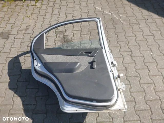 DRZWI LEWY TYŁ LEWE TYLNE CHEVROLET AVEO II T250 KOMPLETNE 05- - 16