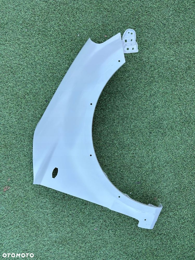 suzuki sx4 sedici 06-14- blotnik prawy nowy oryg