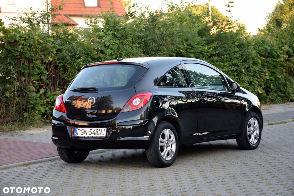 Opel Corsa 1.4 16V Cosmo - 7