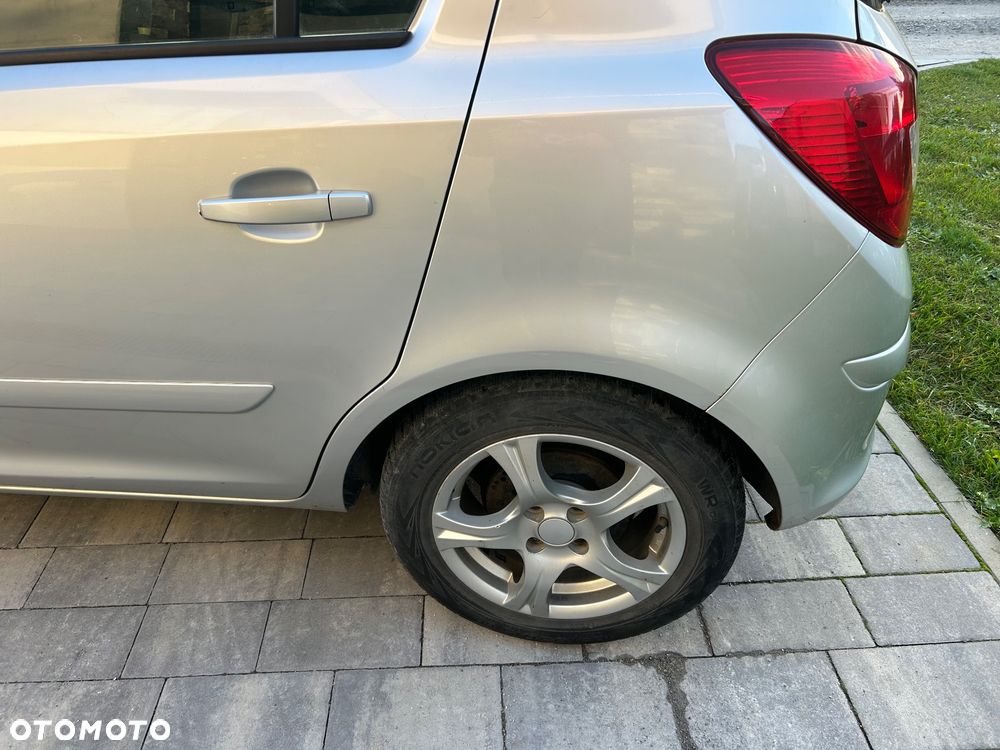 Opel Corsa 1.4 16V Enjoy - 11