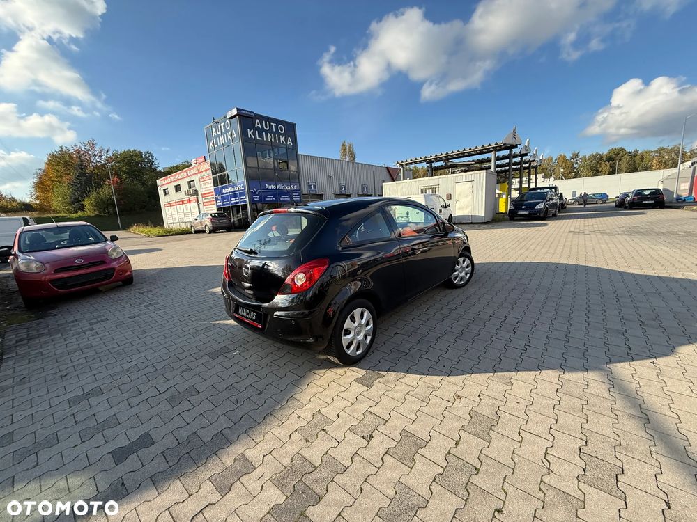Opel Corsa 1.2 16V Cosmo - 9