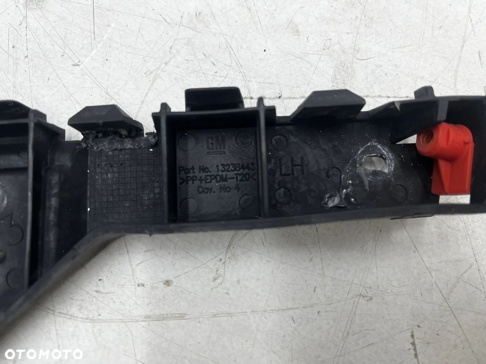 Ślizg Opel Insignia A 08-17r. mocowanie zderzaka wspornik lewe przednie błotnika 13238443 - 5