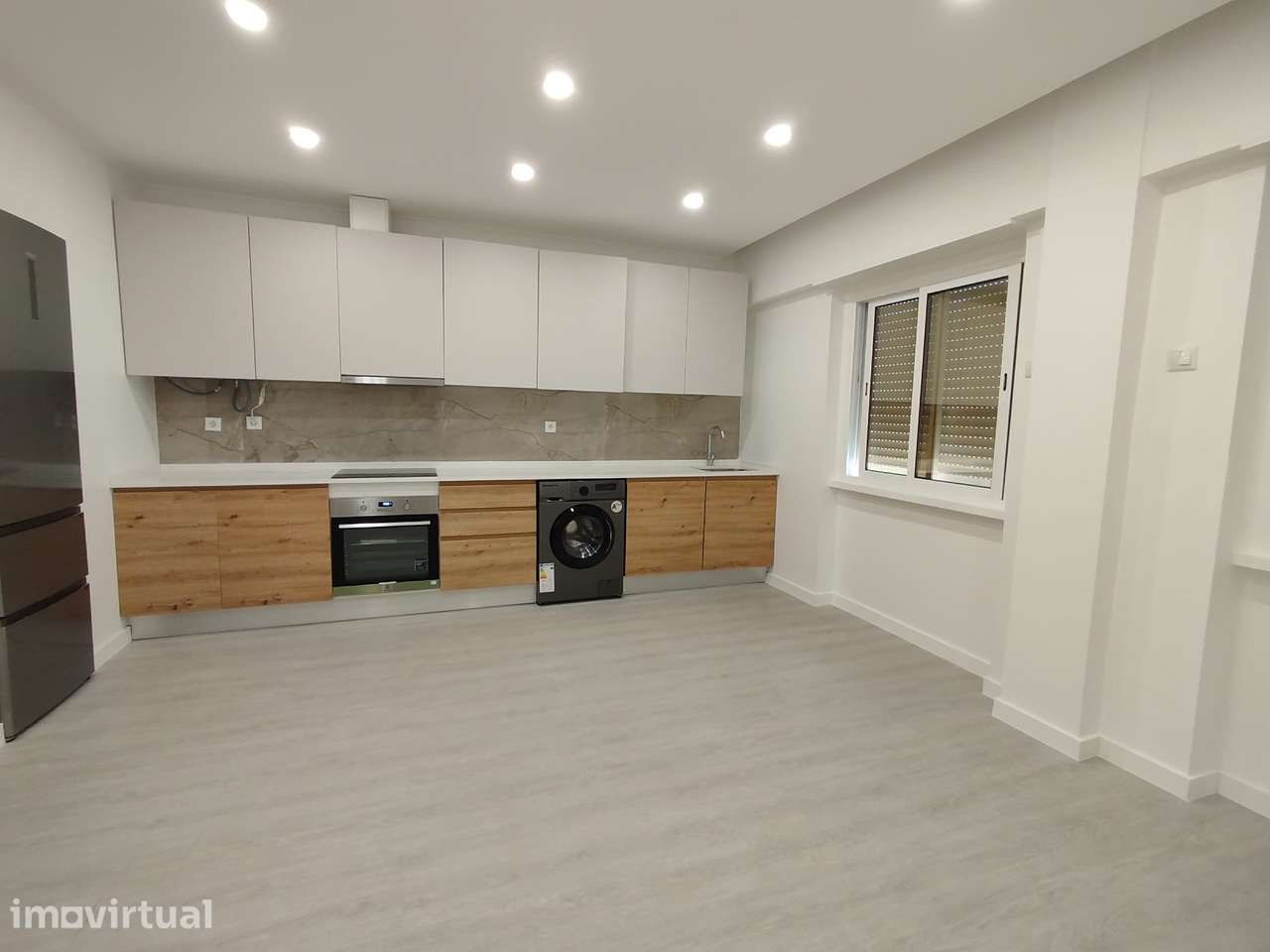 T2 Totalmente Remodelado - Centro da Damaia - Grande imagem: 2/9