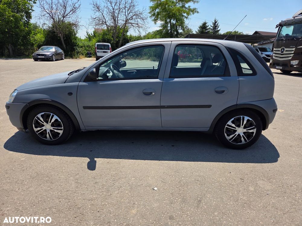 Opel Corsa 1.2i Cosmo - 6